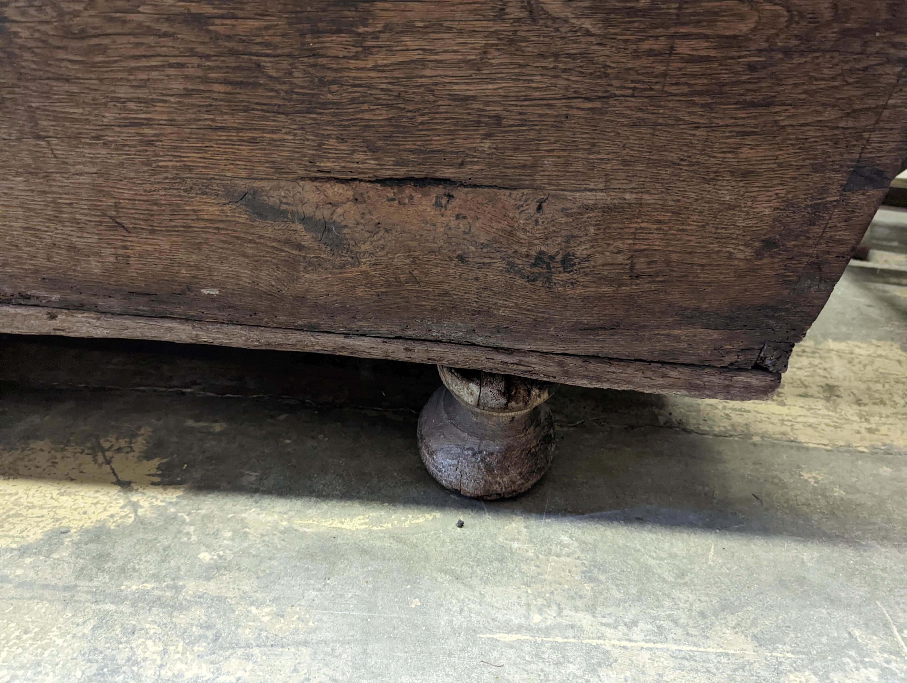 An 18th century Continental wrought iron mounted oak coffer, on pad feet, length 124cm, depth 50cm, height 66cm